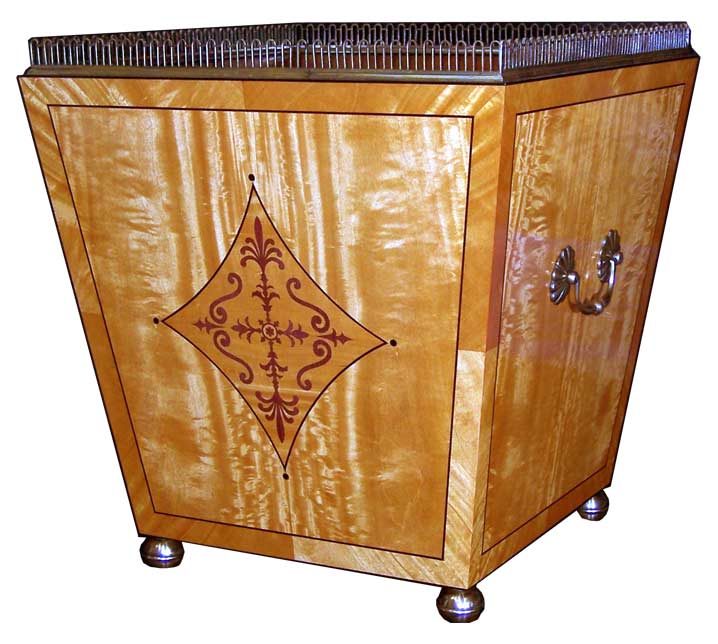 Satinwood wine cooler with figured veneer and inlaid motif